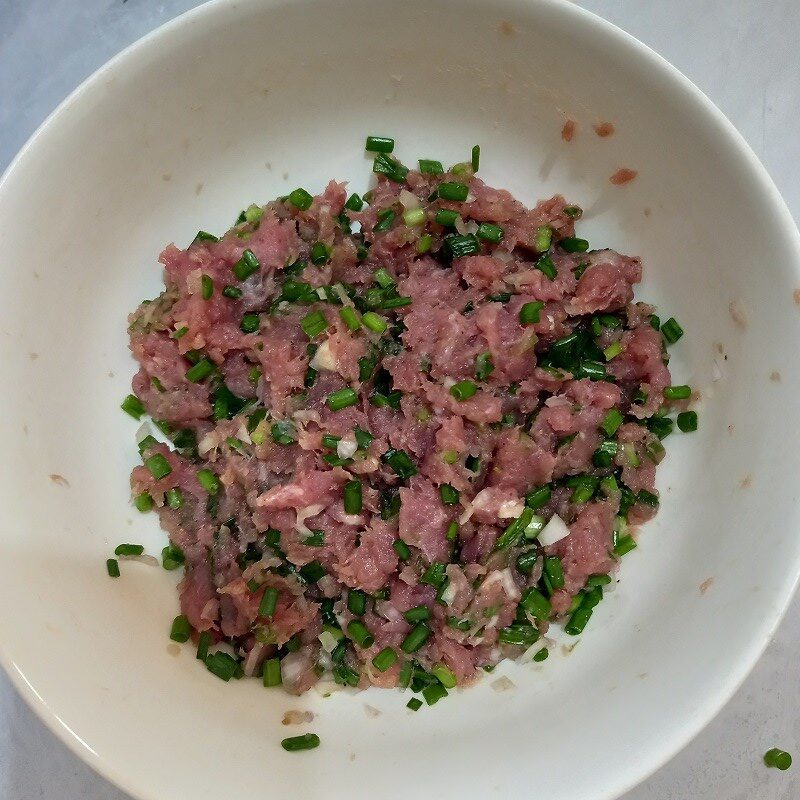 Step 2 Mix, marinate the meat and stuff the filling Steamed stuffed gourd