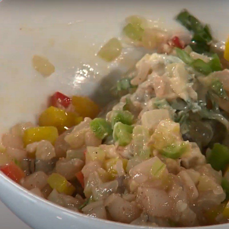 Step 4 Mix and stuff the filling for stuffed seafood bell peppers