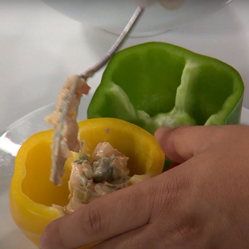 Step 4 Mix and stuff the filling for stuffed seafood bell peppers