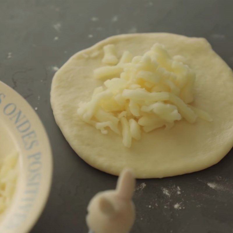 Step 5 Second dough rise Cheese bread in a pan