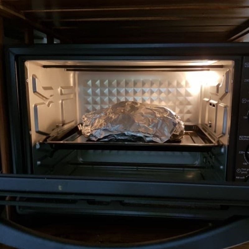 Step 4 Steam the chicken in the oven Salted lemongrass chicken (recipe shared by user)