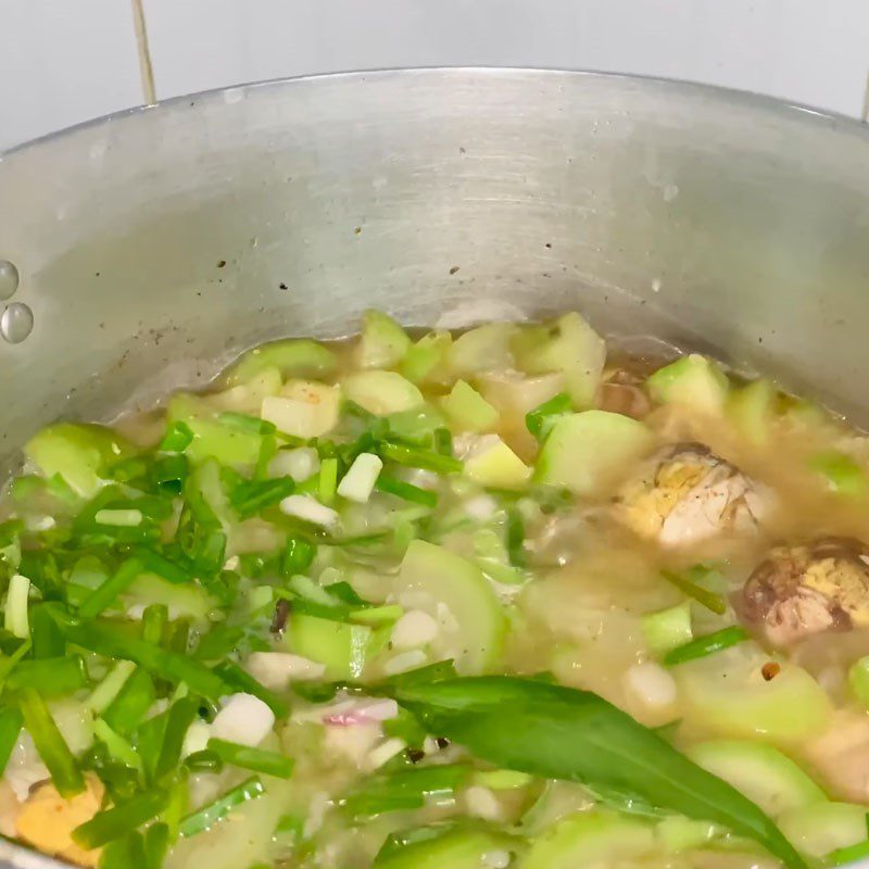 Step 3 Stewed gourd with eggs Stewed fertilized duck eggs with gourd and Vietnamese coriander