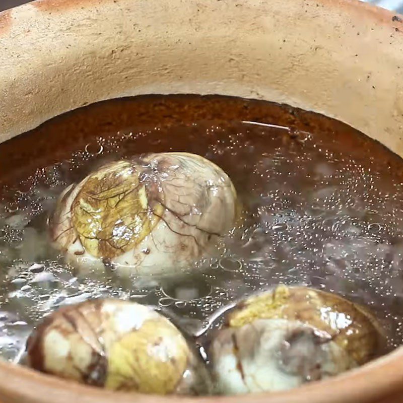 Step 3 Stew eggs with bottle gourd Balut with bottle gourd and jute leaves