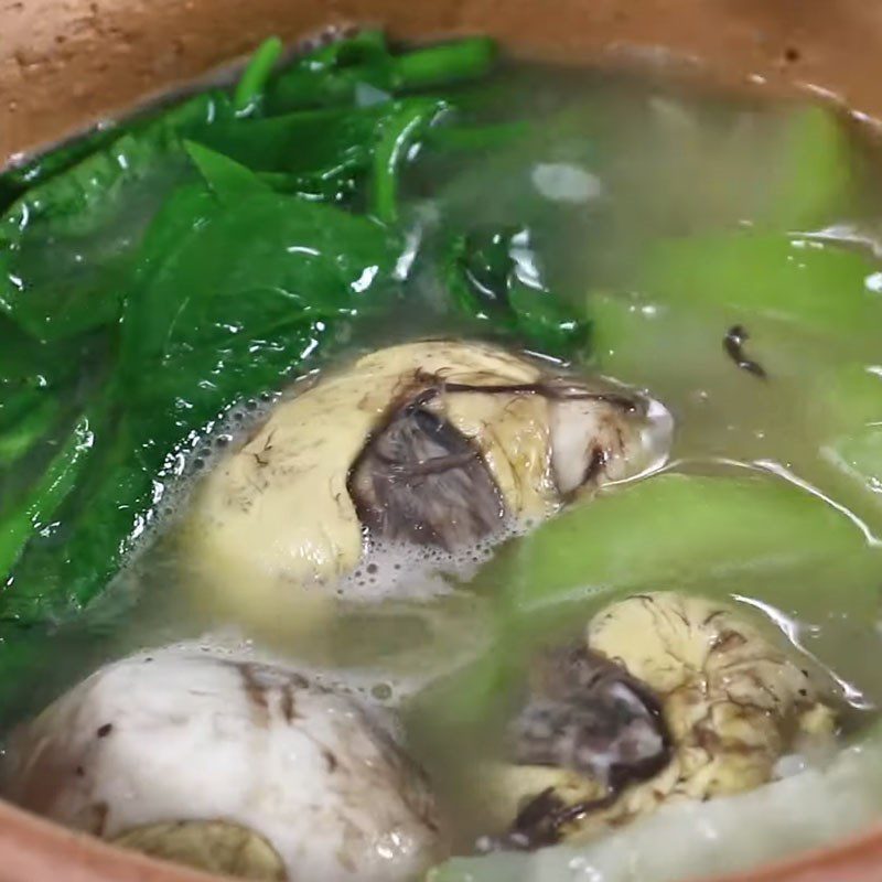 Step 3 Stew eggs with bottle gourd Balut with bottle gourd and jute leaves