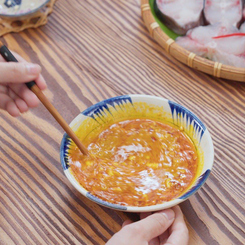 Step 2 Marinating fish Grilled catfish with galangal and fermented rice