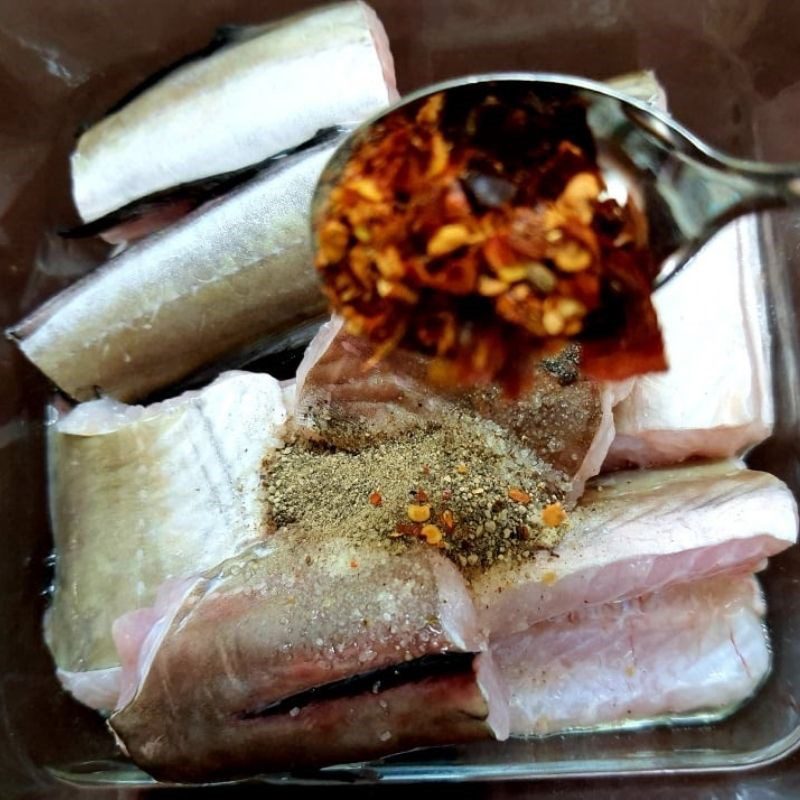 Step 2 Marinate fish Steamed melon fish with mugwort leaves