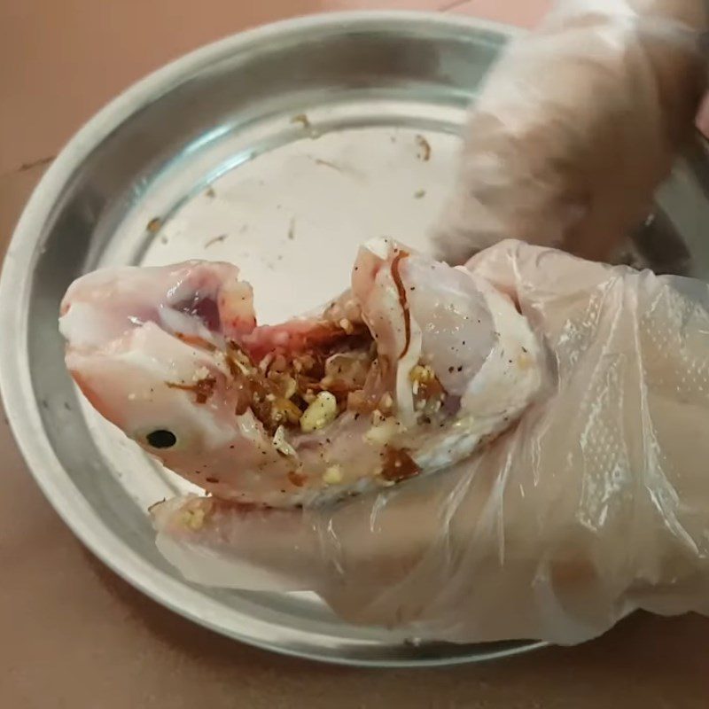 Step 3 Marinate the fish Red tilapia steamed with mushrooms