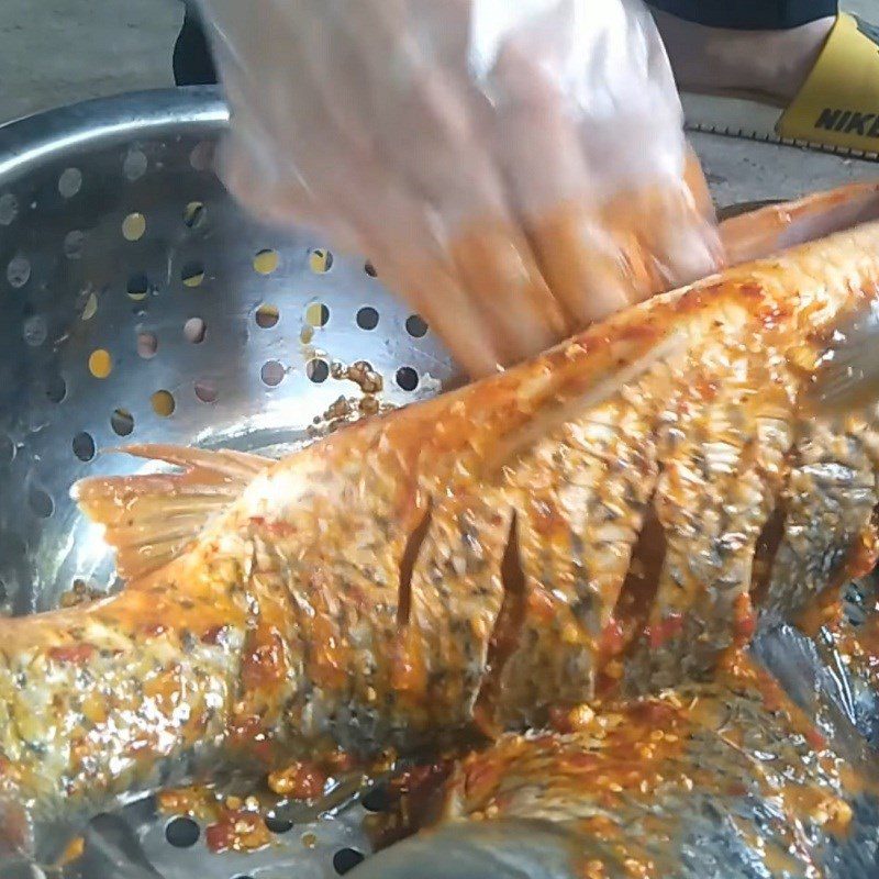 Step 2 Marinating the fish Grilled carp with salt and chili