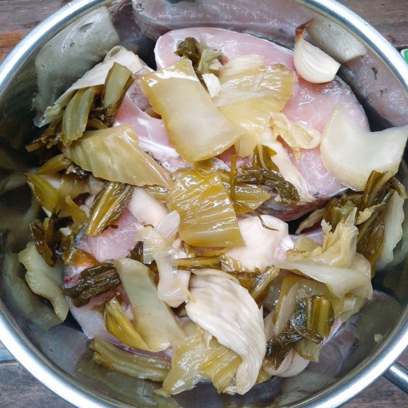 Step 2 Marinate the fish Braised Snakehead Fish with Pickled Mustard