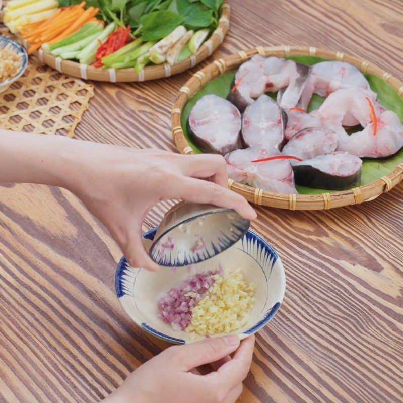 Step 2 Marinating fish Grilled catfish with galangal and fermented rice