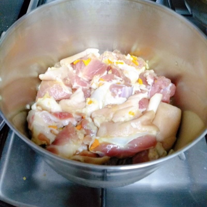 Step 2 Marinate the pork leg Pork leg with turmeric