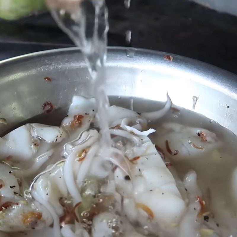 Step 2 Marinate the squid Steamed squid with coconut water