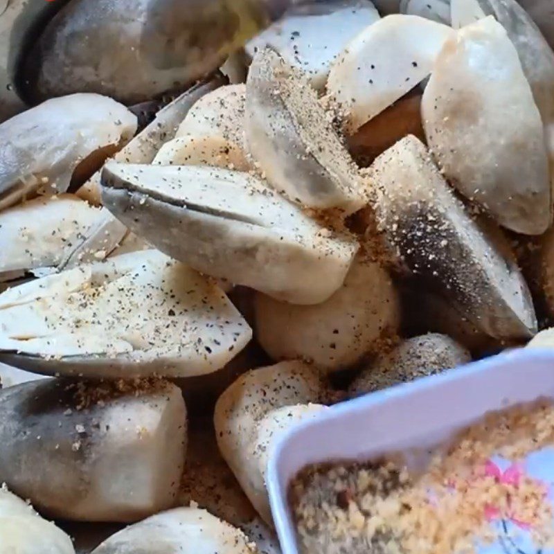 Step 2 Marinate the mushrooms Straw mushrooms steamed with lemongrass and garlic