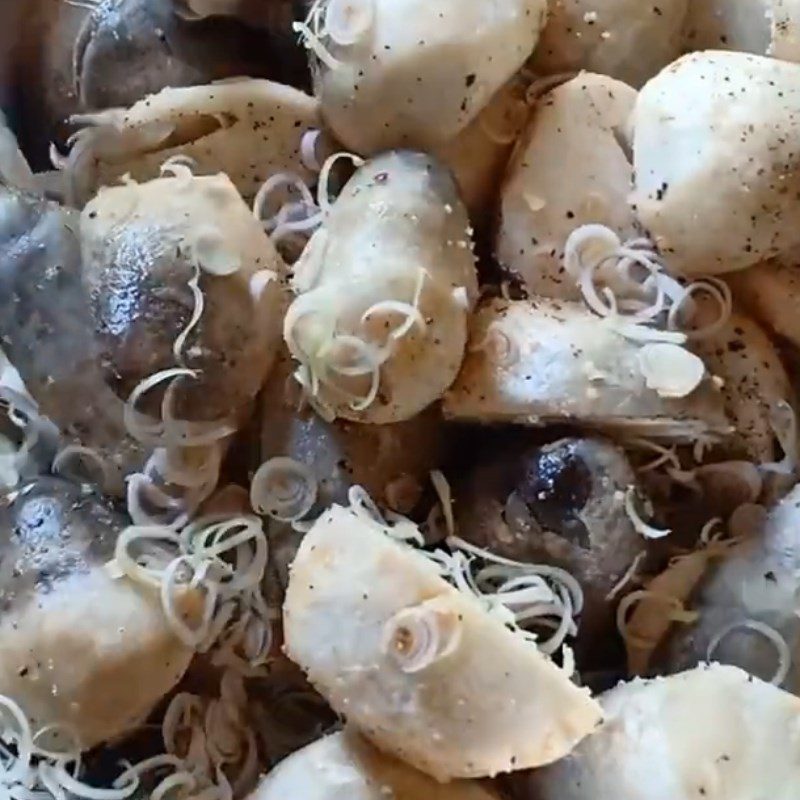 Step 2 Marinate the mushrooms Straw mushrooms steamed with lemongrass and garlic