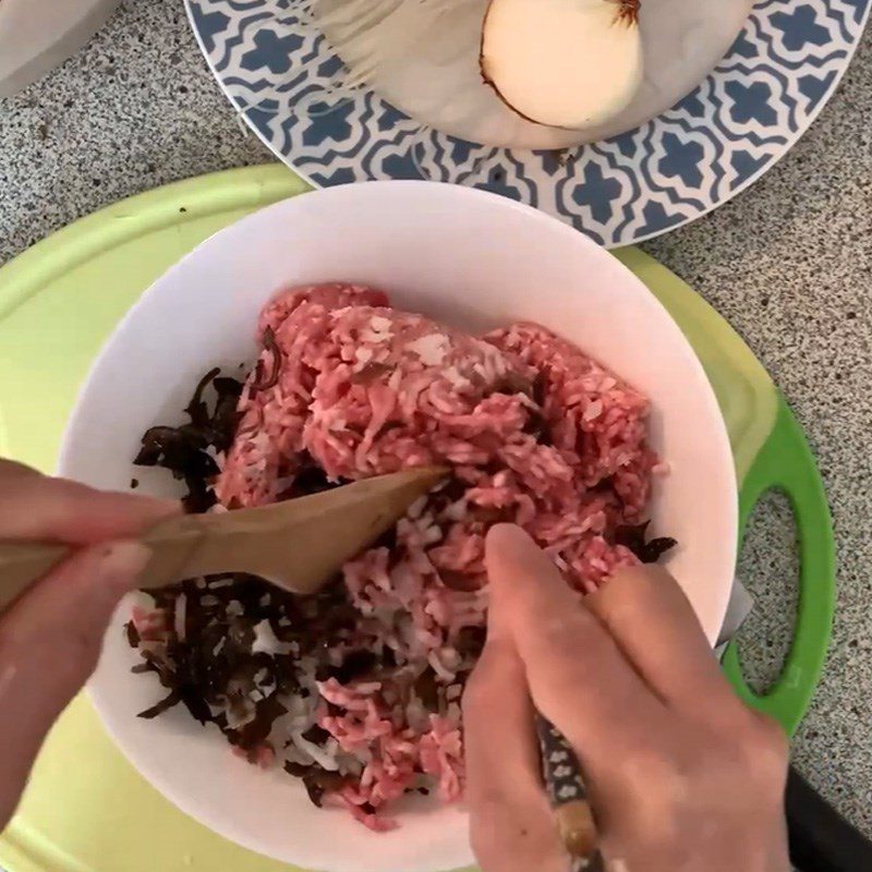 Step 2 Marinate the meat for Grilled Pork with Betel Leaves