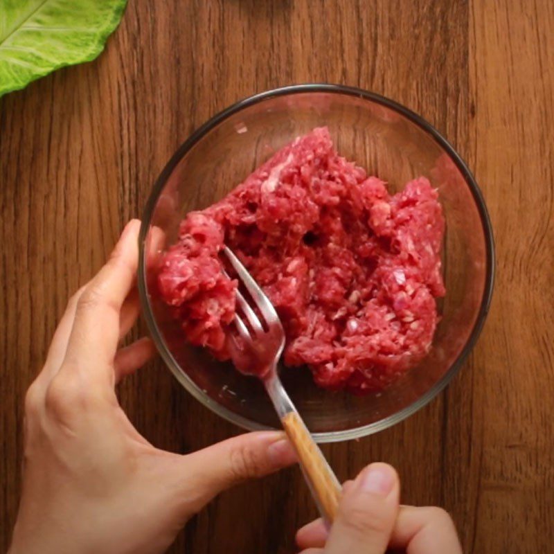 Step 1 Marinate the beef for Beef Ball Soup with Enoki Mushrooms