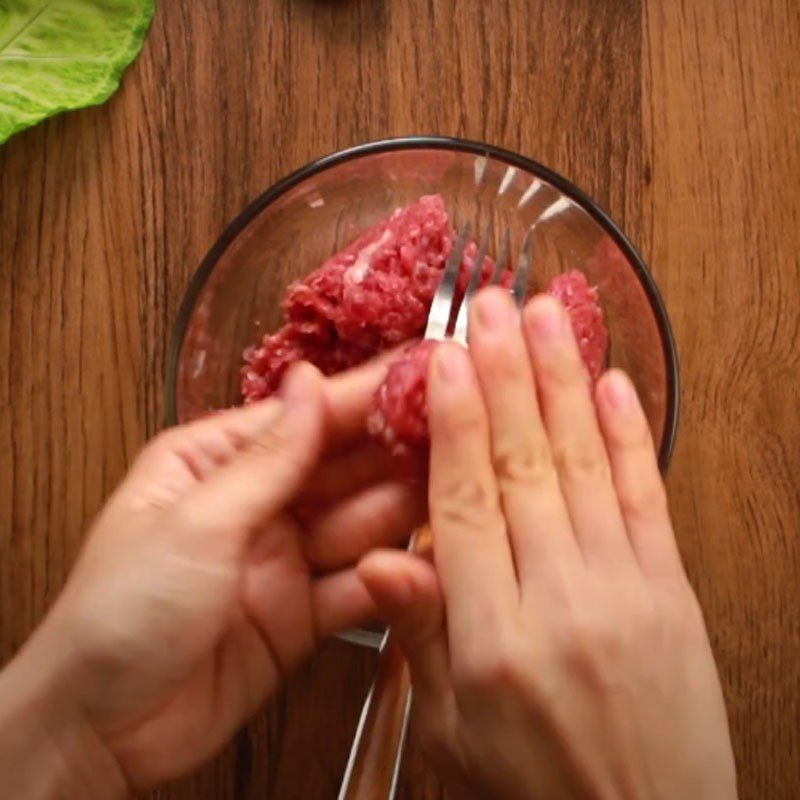 Step 1 Marinate the beef for Beef Ball Soup with Enoki Mushrooms