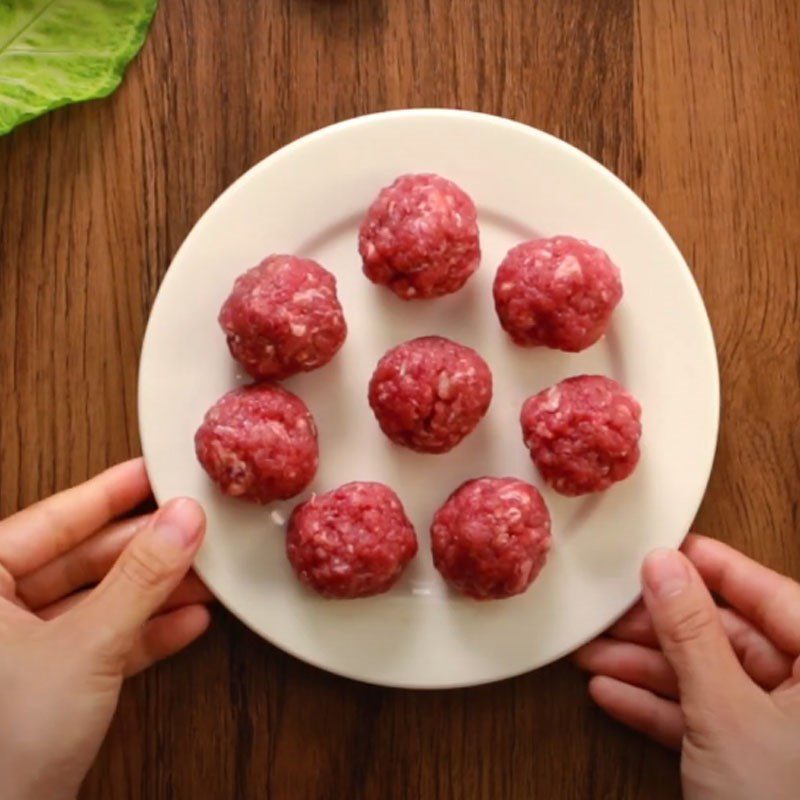 Step 1 Marinate the beef for Beef Ball Soup with Enoki Mushrooms