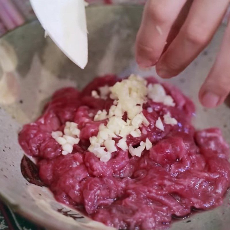 Step 2 Marinate buffalo meat Buffalo meat stir-fried with lolot leaves