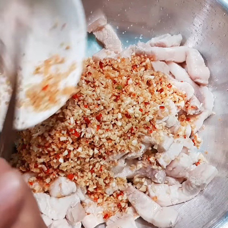 Step 3 Marinate the meat with spices Pork braised with lemongrass