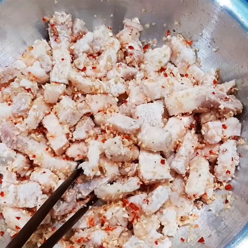 Step 3 Marinate the meat with spices Pork braised with lemongrass