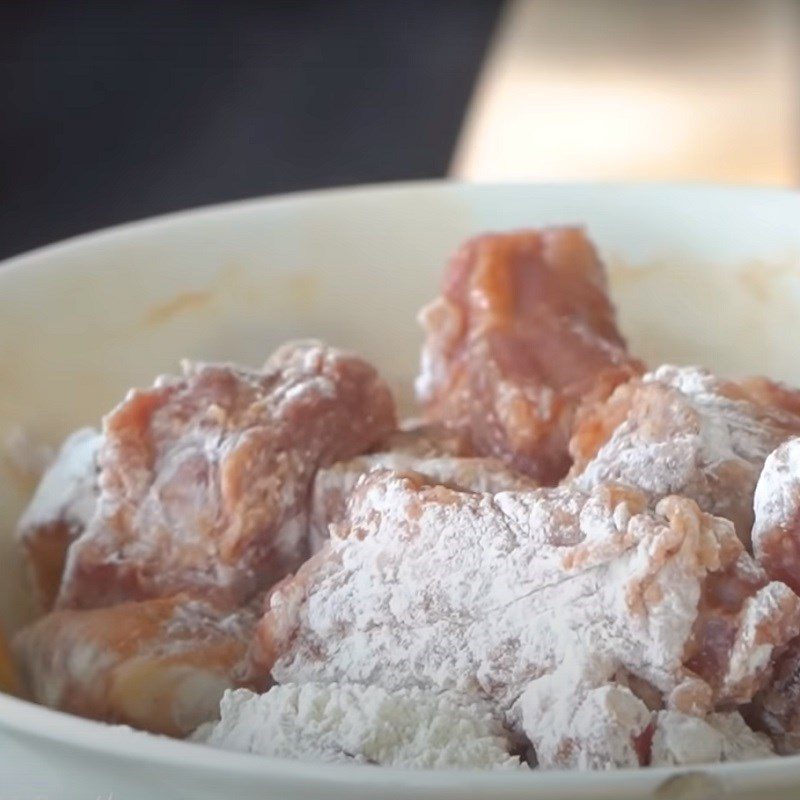 Step 3 Marinate and coat the ribs with flour Salted ribs