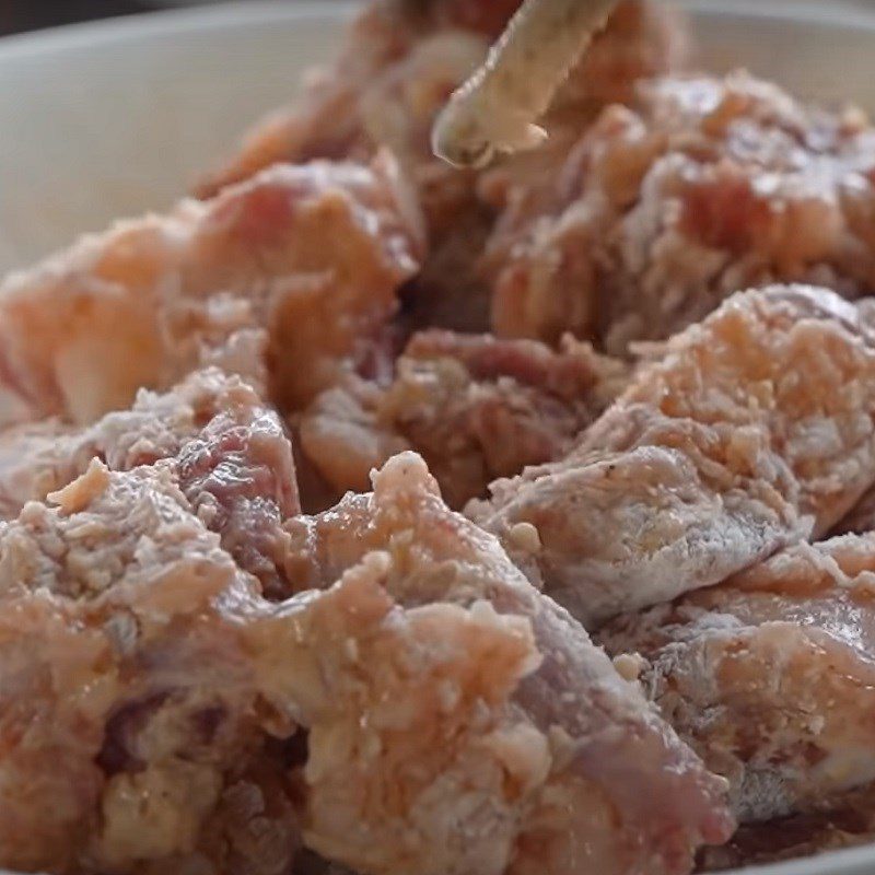 Step 3 Marinate and coat the ribs with flour Salted ribs