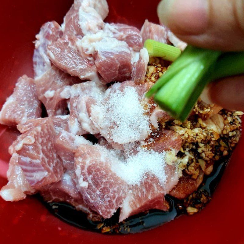 Step 2 Marinate and skewer the meat Grilled pork with leeks