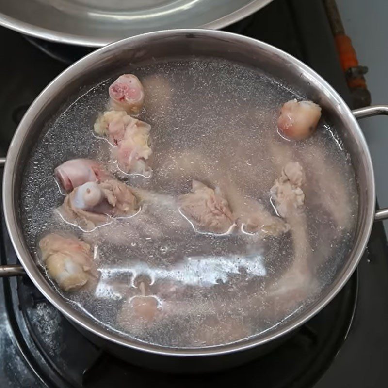 Step 1 Prepare chicken bones and cook the broth for Crab Mushroom Soup