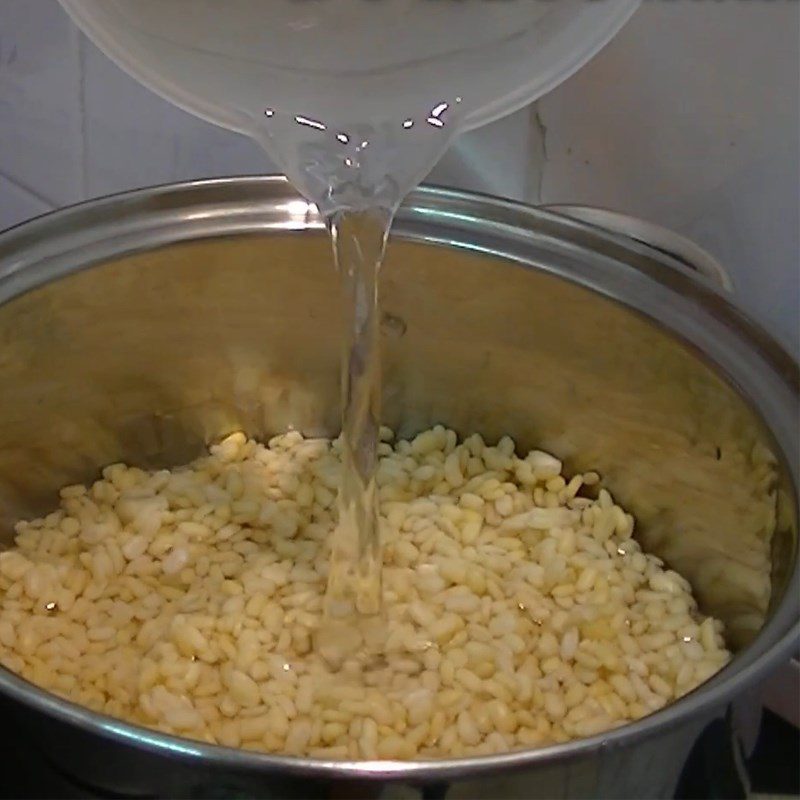 Step 1 Wash, soak and cook mung beans for gac sticky cake