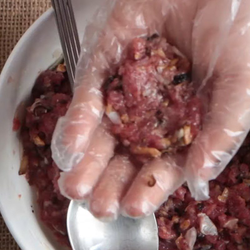 Step 3 Shape the beef into balls with cheese for minced beef cheese balls in tomato sauce