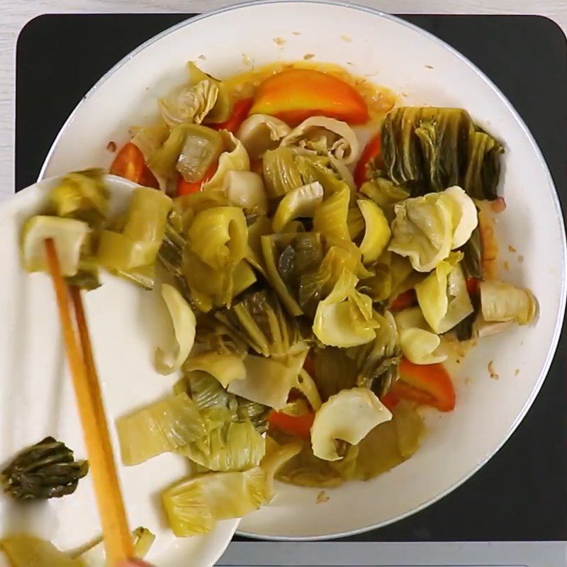 Step 4 Sauté tomatoes and sour cabbage Sour cabbage noodle soup with beef