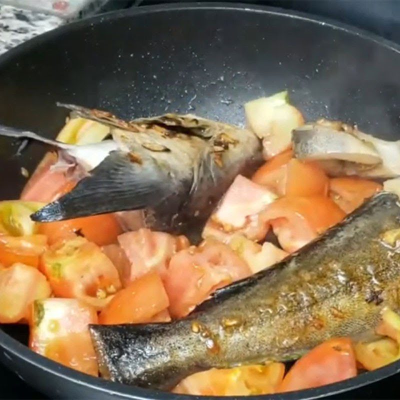 Step 3 Fry fish and tomatoes Baked fish stew