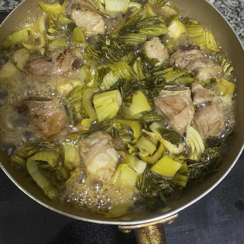 Step 2 Stir-fried Mustard Greens with Sour Ribs