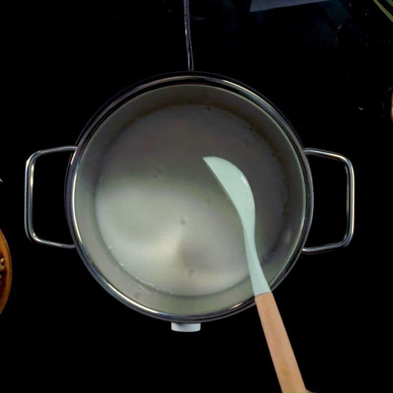 Step 2 Sauté coconut and cook coconut milk Sticky rice with lotus seeds and chicken fat