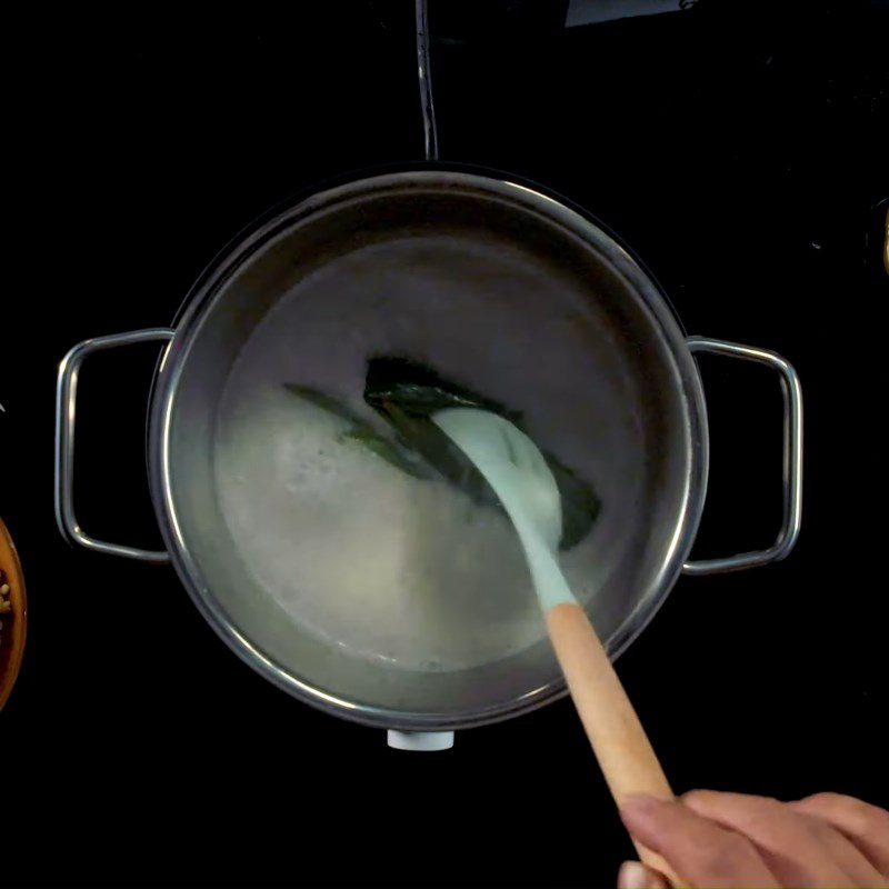 Step 2 Sauté coconut and cook coconut milk Sticky rice with lotus seeds and chicken fat