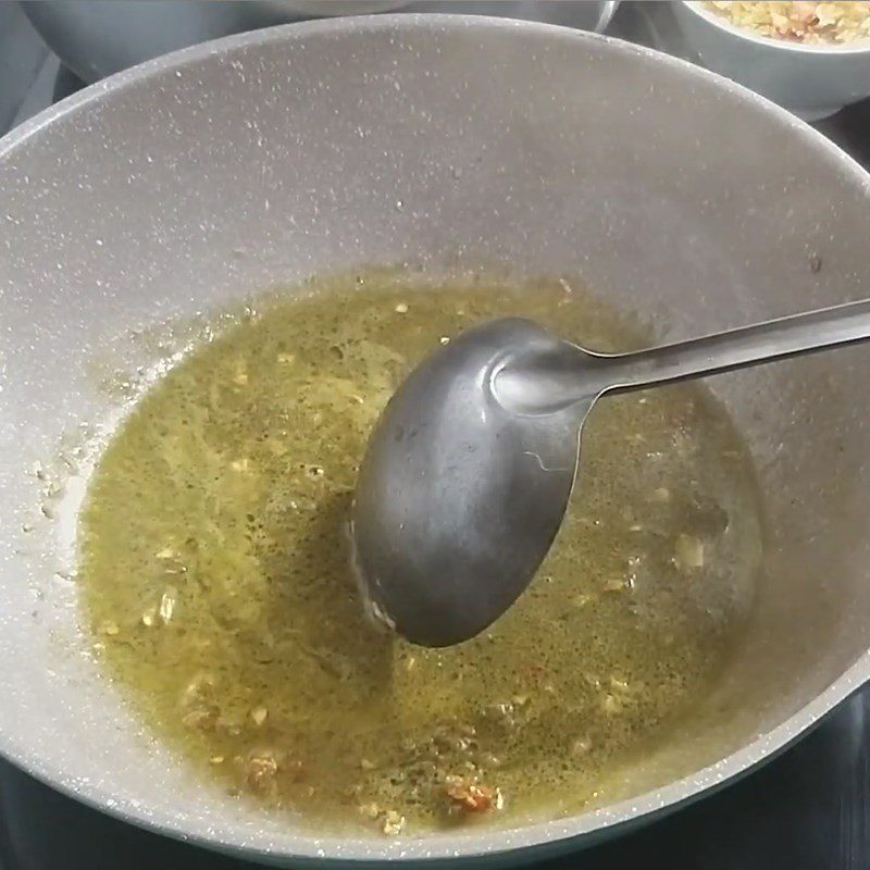 Step 6 Sautéing Crab Meat for Stinky Crab Noodles - Gia Lai Crab Noodle Soup