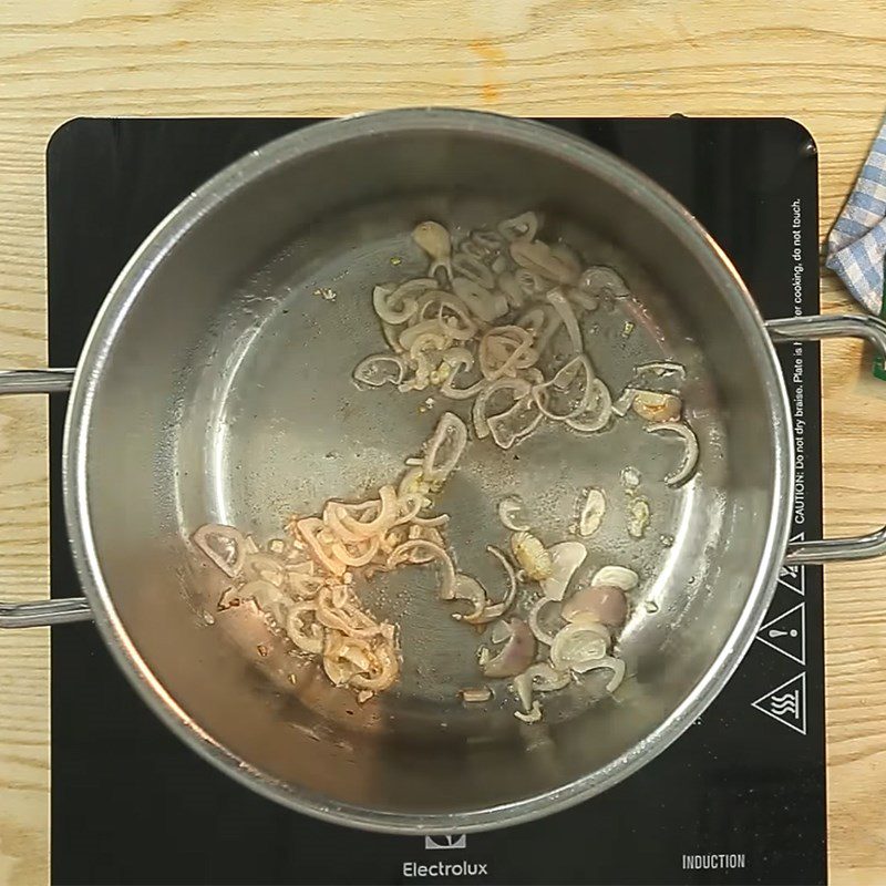 Step 2 Sauté lotus seeds for Lotus Seed Soup