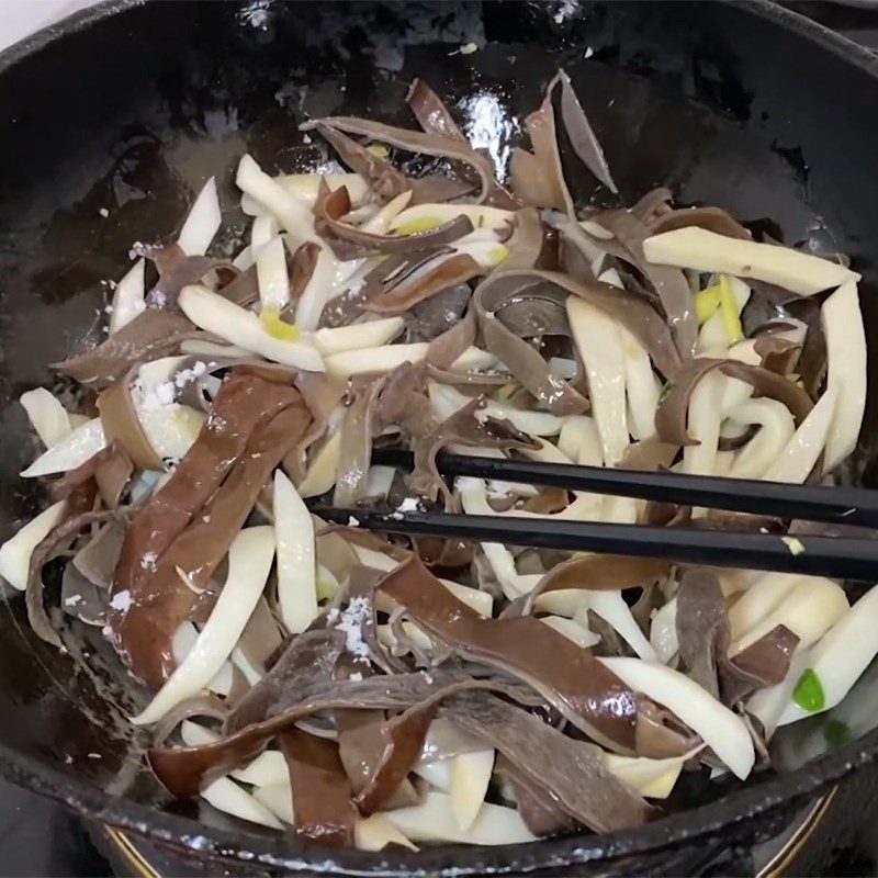 Step 2 Stir-fry mushrooms for vegetarian mushroom spring rolls