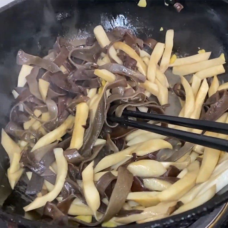 Step 2 Stir-fry mushrooms for vegetarian mushroom spring rolls