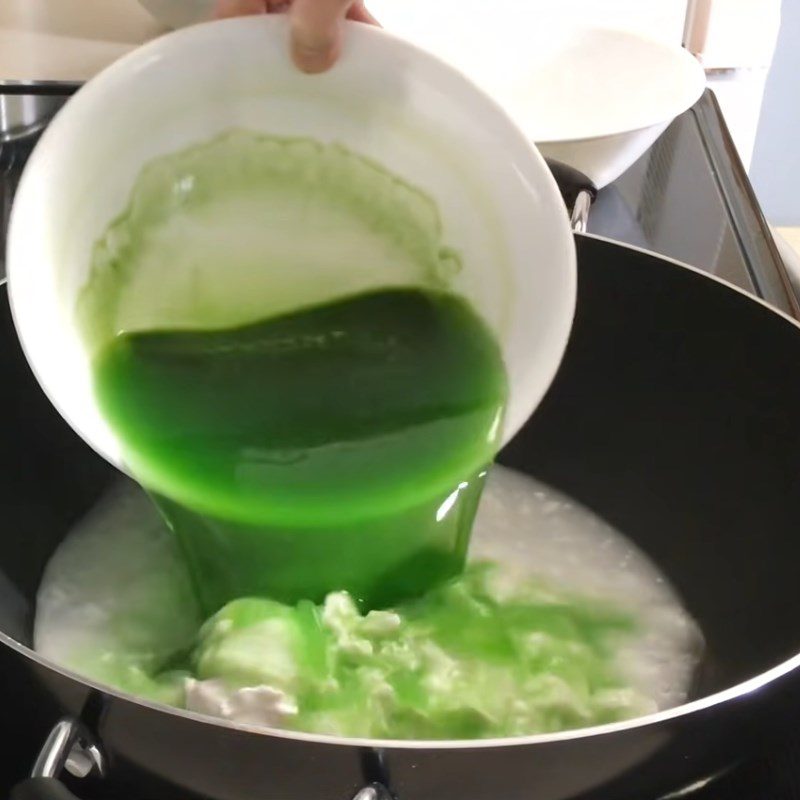 Step 7 Sautéing sticky rice for making sticky rice cake with a pressure cooker