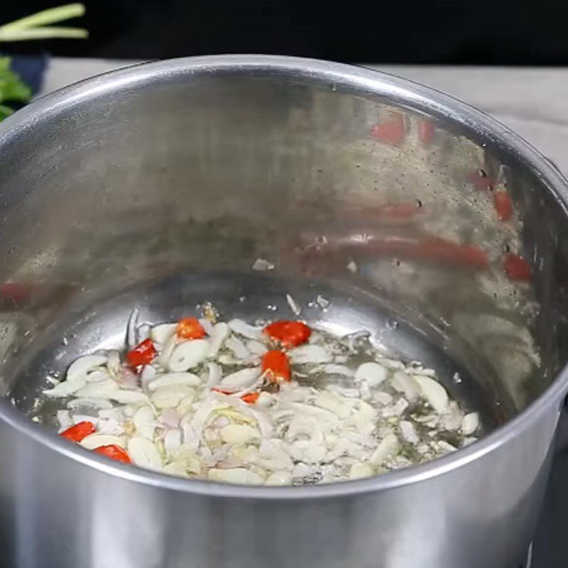 Step 2 Sauté the ingredients Spicy Pig Blood Soup