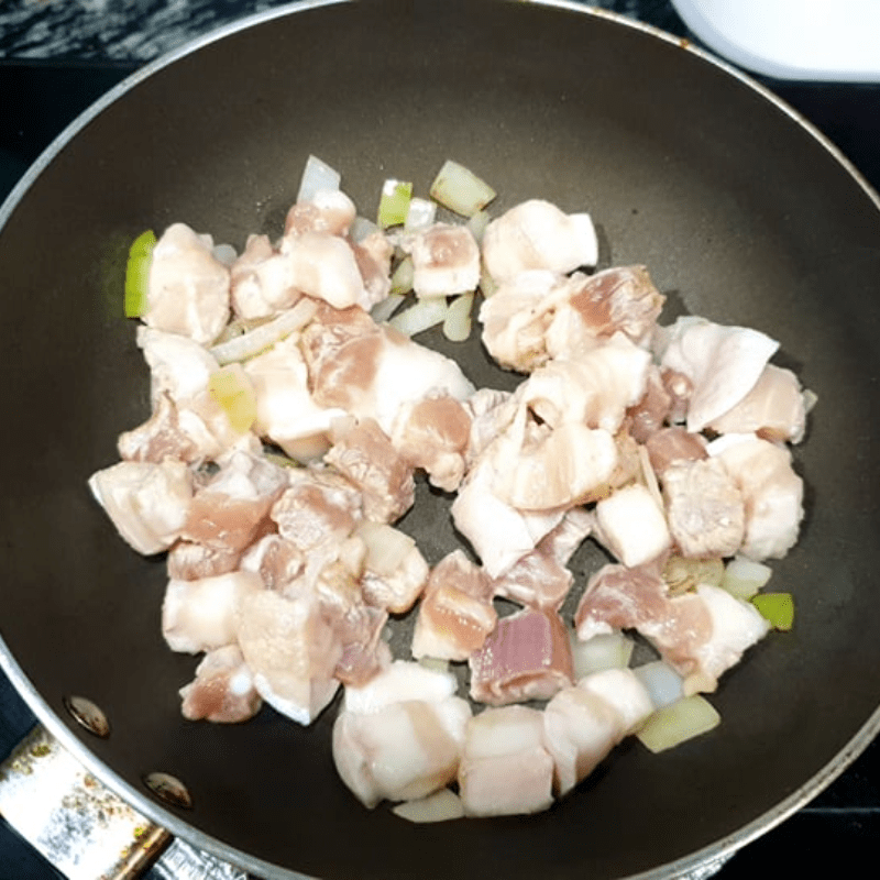 Step 2 Sauté ingredients for Kimchi Oyster Soup