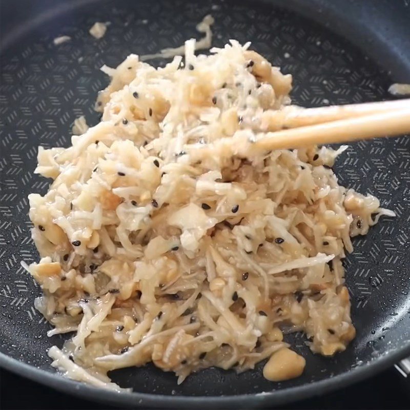 Step 1 Sauté the coconut filling for Pandan Cake with Coconut Filling