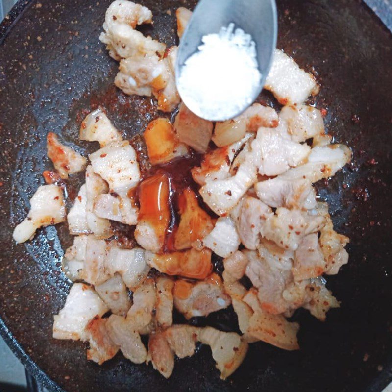 Step 2 Sauté the meat Pork sauté with king oyster mushrooms