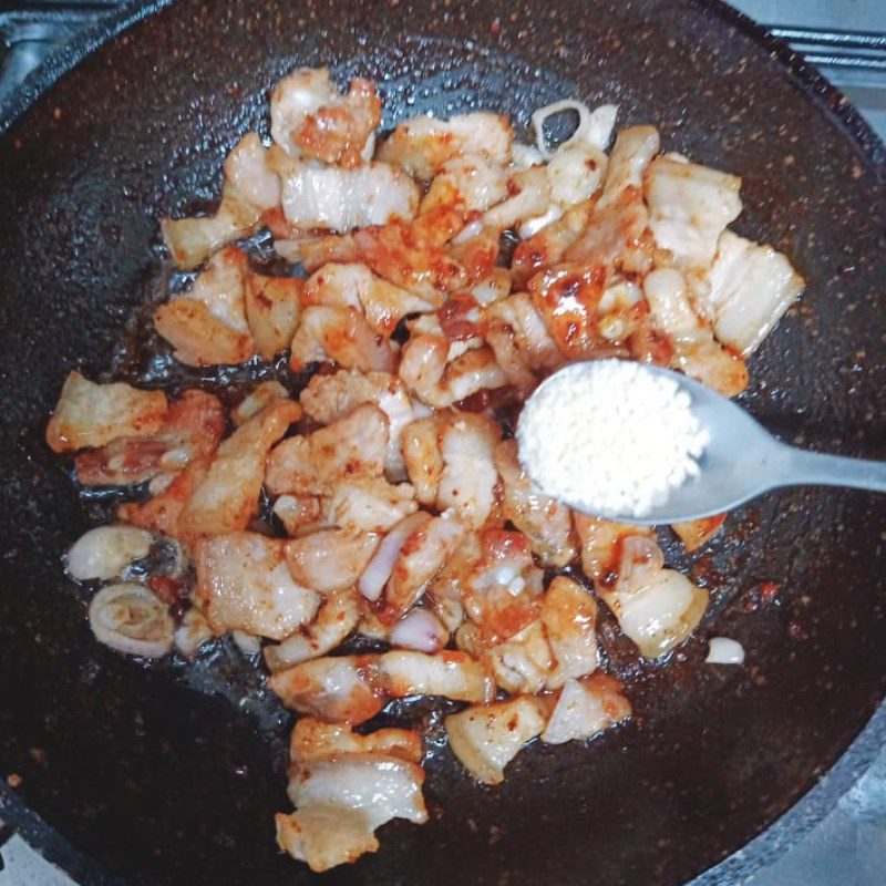 Step 2 Sauté the meat Pork sauté with king oyster mushrooms