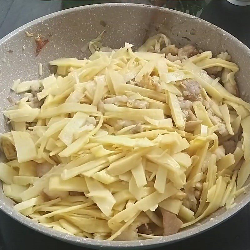 Step 7 Stir-fried pork belly and bamboo shoots Stinky crab noodle - Gia Lai crab noodle