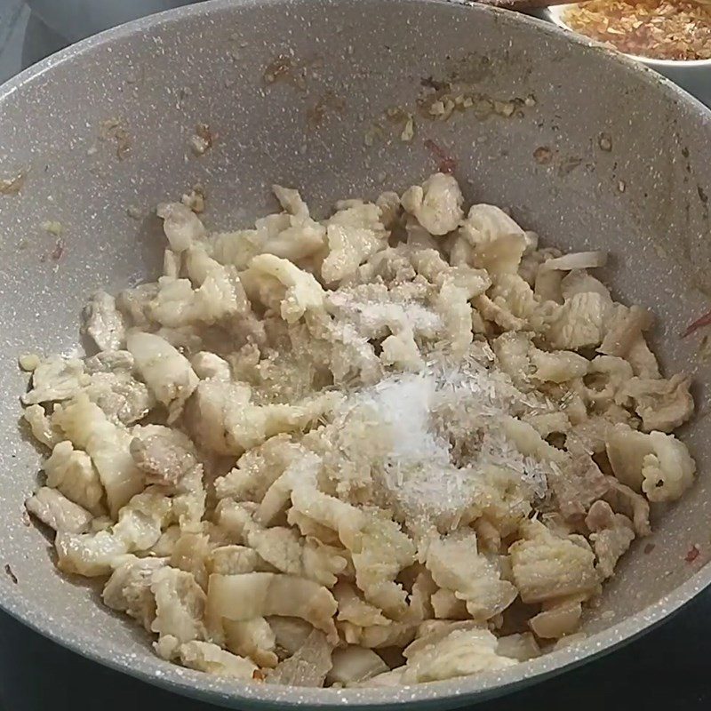 Step 7 Sautéing Pork Belly and Bamboo Shoots for Stinky Crab Noodles - Gia Lai Crab Noodle Soup