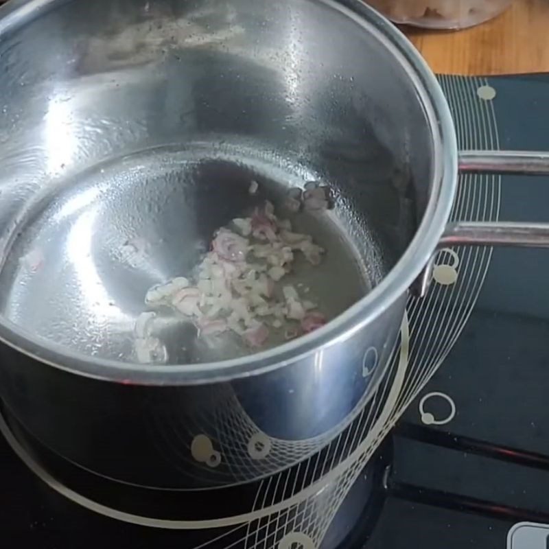 Step 3 Stir-fry chicken Chicken soup with pumpkin and lotus seeds