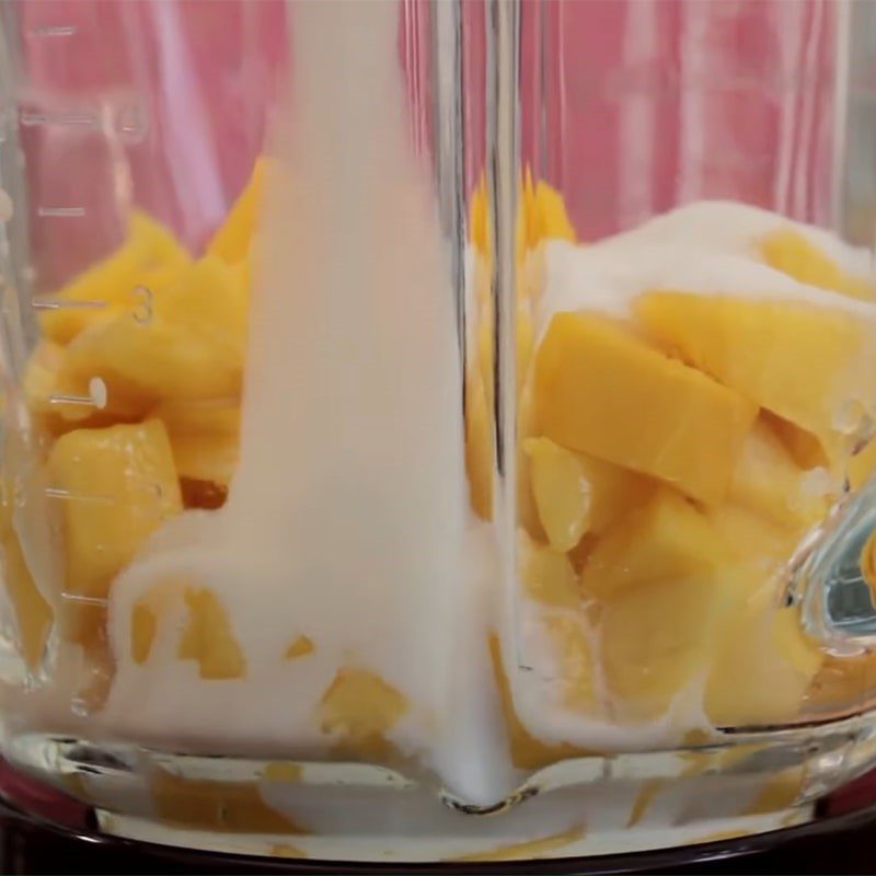 Step 2 Blend mango for Mango Lassi